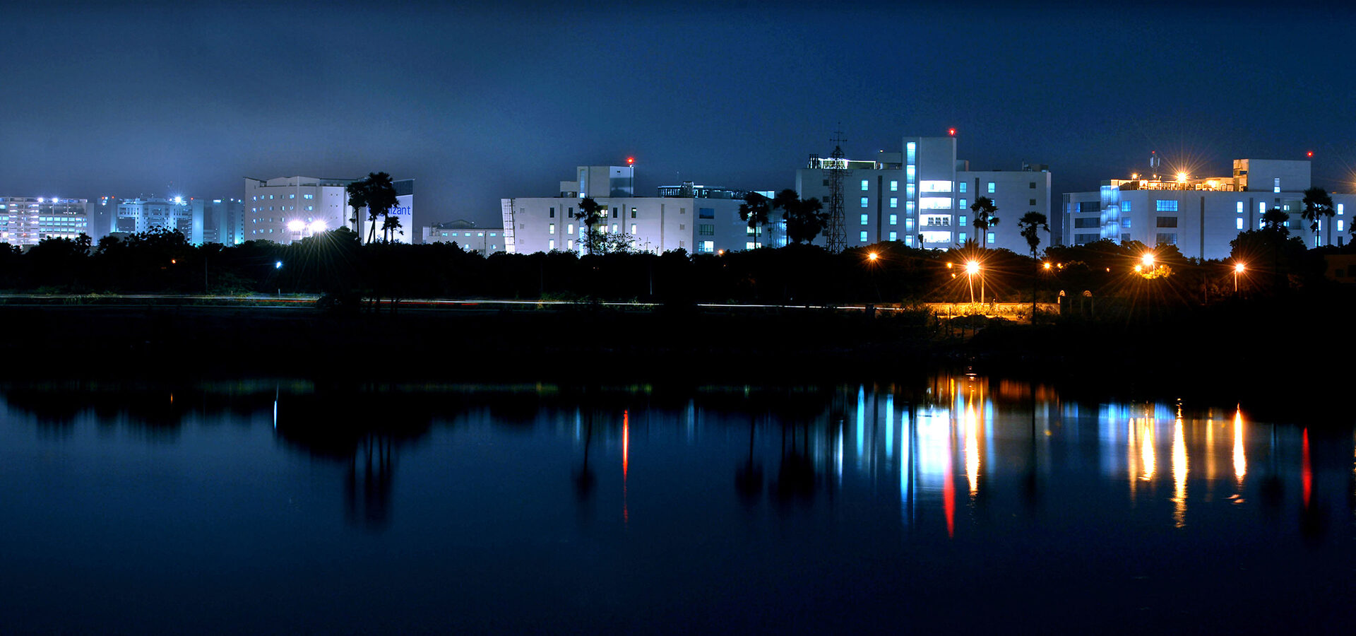 The IT parks in Tharamani and Perungudi like  Ascendas, Ticel Park,Tidel Park, Cognizant and RMZ Millinia business complex first part are giving a spectacular view  from the Perungudi Lake especially in the night  . Shaju john